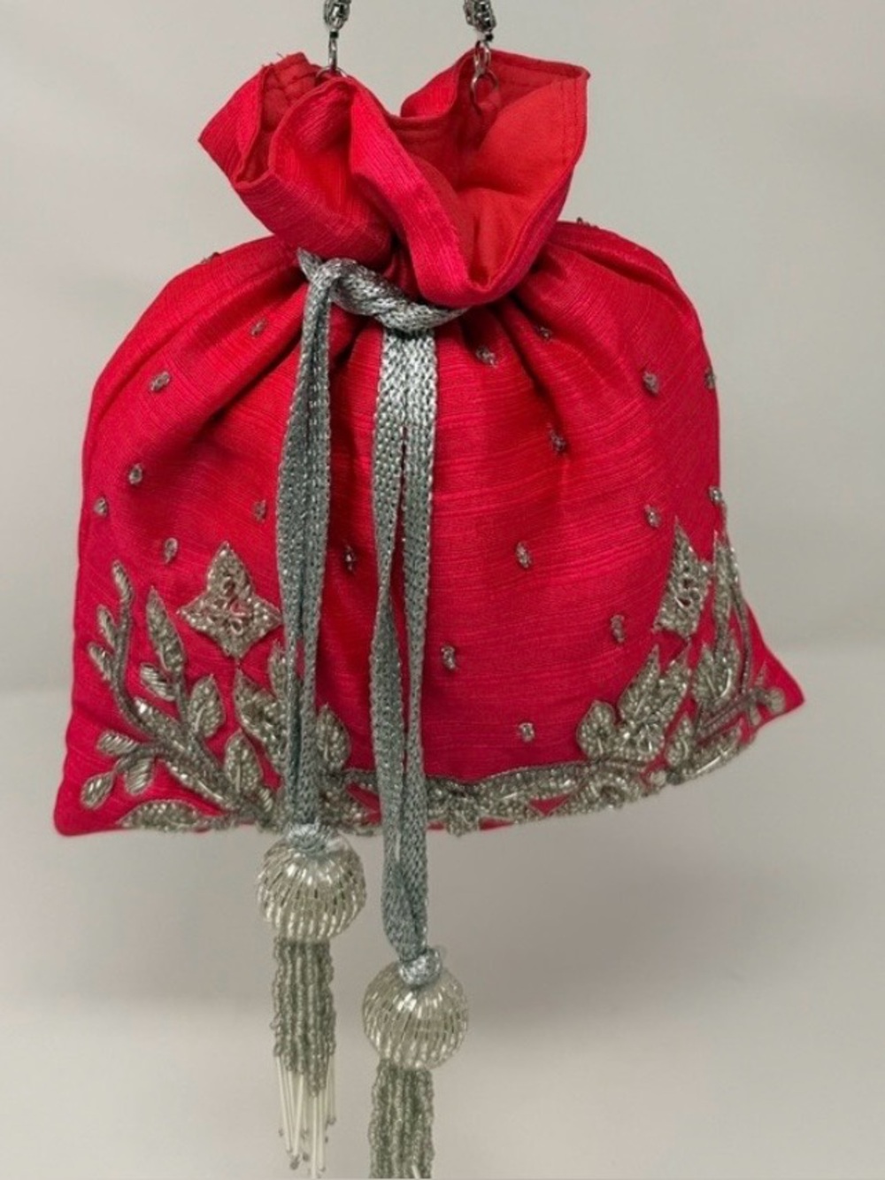 Pink Embroidered Drawstring Potli Bag with Silver Tassels…
